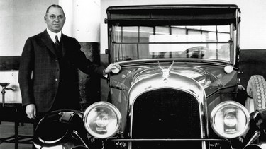 Walter Chrysler in 1924 with the first car to bear his name.