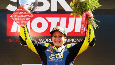 Ana Carrasco on the winner's podium after the World Supersport 300 race at the Autodromo Internacional do Algarve in Portugal on Sunday, September 17.