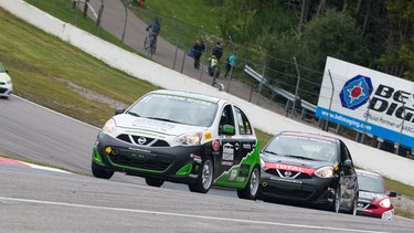 Competitors vie for position at the Nissan Micra Cup race at the Chevrolet Silverado 250 at Canadian Tire Motorsport Park.