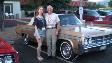 Jamie Cox with granddaughter Serena and the 1963 Oldsmobile Starfire they drove on a 2,210-mile bonding trip.