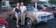 Jamie Cox with granddaughter Serena and the 1963 Oldsmobile Starfire they drove on a 2,210-mile bonding trip.