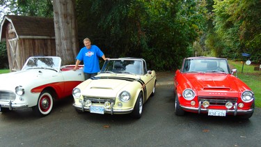 Mitch Jensen with his stable of early Datsun sports cars including the ultra-rare 1962 Fair
Lady (at left).