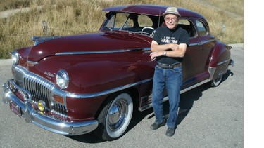 Dick Besler with his beautifully restored DeSoto.