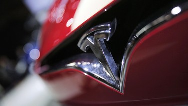 The logo of the Tesla Model S on display at the Paris Auto Show in Paris on Sept. 30, 2016.