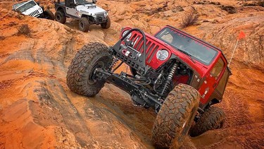 Jeep crawling over rocks