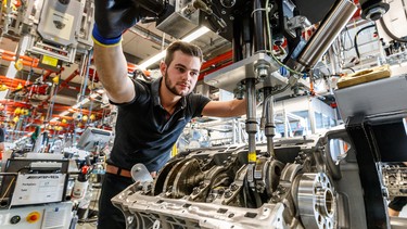 A technician builds an engine at the Mercedes AMG plant in Affalterbach, Germany.