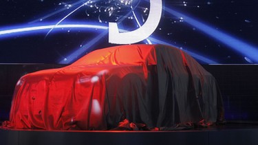 The new Subaru Legacy concept vehicle is under wraps during the press preview for the Detroit International Auto Show on January 11, 2009 in Detroit, Michigan.