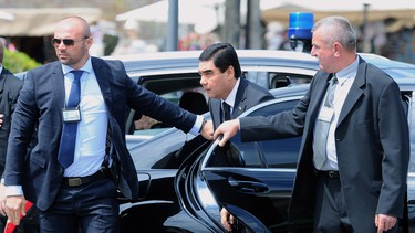 Turkmenistan President Gurbanguly Berdimuhamedov, noted with an aversion to black cars, steps out of a black Mercedes-Benz S-Class prior to a meeting with his Hungarian counterpart, not pictured, at the presidential palace in Budapest on June 18, 2014. Berdimuhamedov apparently doesn't really like the idea of women driving, either.