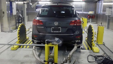 In this Oct. 13, 2015, file photo, a Volkswagen Touareg diesel is tested in the Environmental Protection Agency's cold temperature test facility in Ann Arbor, Michigan