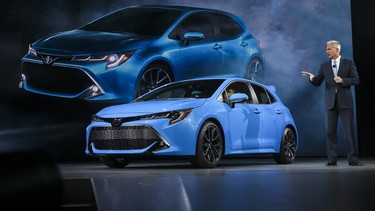 Jack Hollis, group vice president of the Toyota division at Toyota Motor North America (TMNA), presents the 2019 Corolla Hatchback at the 2018 New York Auto Show.