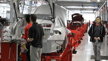 Tesla assembly line production factory