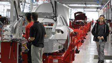 Tesla assembly line production factory