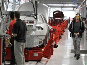 Tesla assembly line production factory