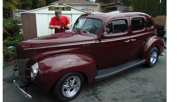 Expert car detailer Glen Yates buffs up the 33-year-old paint on his 1940 Ford street rod.