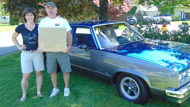 Stroke survivor Pat Bell with Anna Markey of the Chilliwack & Abbotsford Stroke Recovery Association. The sign Pat is holding is one he displays on his car at shows. It reads in part: “I am a stroke survivor and a car nut. My car rusted away through the years and, when 2015 was over, my car was too. That was so sad. Well, here’s the other car after 1 ½ years and $3,000. I did everything in the driveway. So this goes out to other stroke survivors and relatives: Love what you do; Don’t give it up; You can do it!”