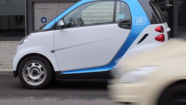 A Car2Go vehicle is parked on a street in central Berlin on Wednesday, Feb. 19, 2014.