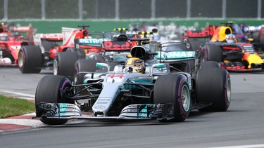 Mercedes driver Lewis Hamilton (44) of Great Britain leads the pack at the start of the Canadian Grand Prix,  Sunday, June 11, 2017  in Montreal.