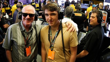 Writer Andrew McCredie with his son Callum in the Renault Sport F1 team garage during last weekend's Canadian Grand Prix in Montreal.