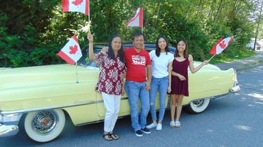 Edith and Jonathan Jarin with daughters Elizabeth and Jillian will celebrate Canada cruising in their restored 1953 Cadillac Coupe de Ville.