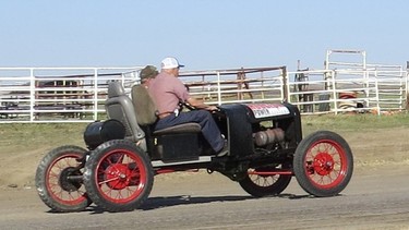 On it's shakedown run at Dinosaur Downs Speedway, the 1926 Model T racer completed by John Gallagher (at the controls) and Joe DeMott in the late Ken Hudgeon's memory performed very well.