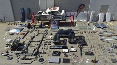 A 1954 Studebaker that is under restoration laid out in pieces. This is only one-third of the parts as the engine, transmission and rear end are not pictured.