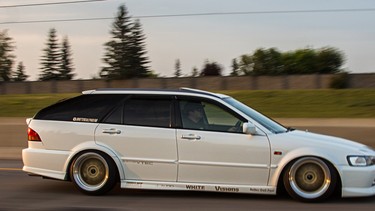 Paul Tait’s family hauler, his customized 1999 Honda Accord SiR wagon, draws plenty of attention — something his eight-year old son enjoys, but his 11-year old daughter, not so much.