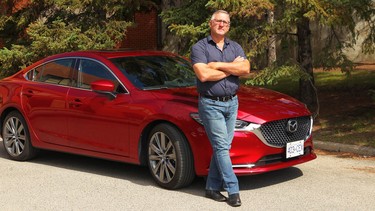 Darren Boser with the 2018 Mazda6 he drove in and around Calgary.