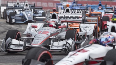 Drivers take the first corner as they start the Honda Indy, in Toronto on Sunday, July 16, 2017.