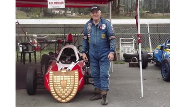Formula Vee competitor Al Ores with the Sports Car Club of B.C. Sportsmanship Award that is named after him.