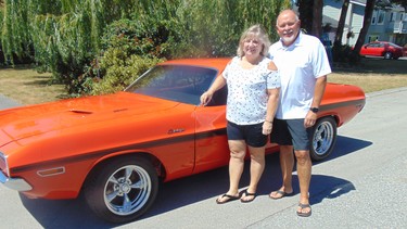 Erna and Bill Dingwall with the 1970 Dodge Challenger muscle car they drove in high school.