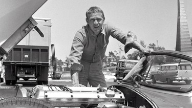 Steve McQueen on the set of the CBS television western "Wanted: Dead or Alive" in Hollywood with his Jaguar XKSS, special racing model, in 1960.