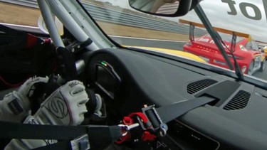 Valentin Hasse-Clot behind the wheel of a Porsche race car in the U.K.