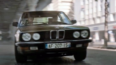 A scene from Mission Impossible: Fallout, with Tom Cruise driving an E28 M5.
