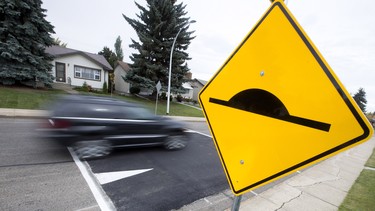 Traffic makes its way over new traffic calming speed bumps (speed tables) near 64 Street and 94 B Avenue, in Edmonton Alta.