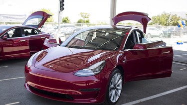 A Tesla Model 3 electric vehicle is displayed during the California Air Resources Board (CARB) 50th Anniversary Technology Symposium and Showcase in Riverside, California, on May 17, 2018.