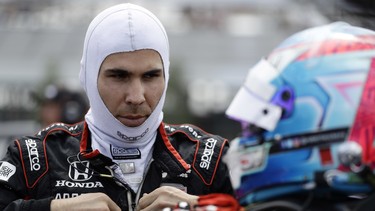 Robert Wickens prepares to qualify for Sunday's IndyCar series auto race, Saturday, Aug. 18, 2018, in Long Pond, Pa