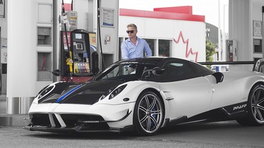 Pfaff Auto's Chris Green gases up a Pagani Huayra. The Huayra BC, a $4.5 million hypercar, makes its Canadian public debut at the Luxury & Supercar Weekend.