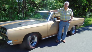 Montreal automotive writer and concours judge Michel Lamoureux with his restored 1969 Plymouth Roadrunner.