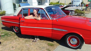 Stephane Eckstein with the 1963 Ford Falcon Sports Coupe she restored.