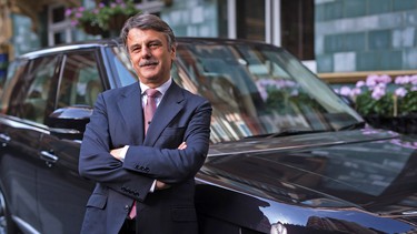 Ralf Speth, chief executive officer of Jaguar Land Rover, with one of the company's Range Rover Autograph SUVs  in London.