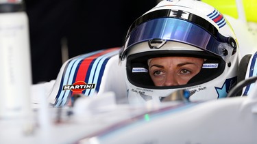 In this file photo, development driver Susie Wolff of Great Britain and Williams sits in her car in the garage during practice ahead of the German Grand Prix at Hockenheimring on July 18, 2014 in Hockenheim, Germany.