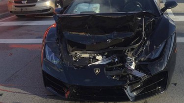 A crashed Lamborghini that had run into the back of a Ford F-250 in Miami.