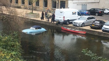 A sunk Porsche 356 Speedster replica in a U.K. canal.