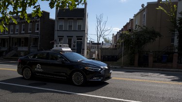 A Ford Fusion hybrid goes for a spin in Northeast Washington in late October 2018. The mapping specialists from Argo AI, a self-driving start-up that Ford is backing with a $1 billion investment, drove the vehicle in manual mode.
