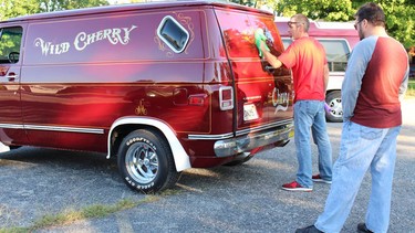 Chris Carter polishing the just-restored "Wild Cherry" ahead of his being arrested for allegedly stealing it