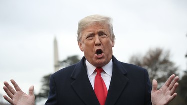 U.S. President Donald Trump answers questions from the press while departing the White House on November 26, 2018 in Washington, DC.