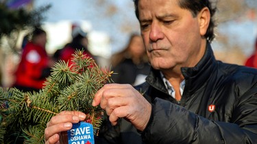 Unifor President, Jerry Dias, helps launch the Unifor #SaveOshawaGM campaign by unveiling its Tree of Hope in Memorial Park in Oshawa, Ontario, Canada, December 13, 2018.