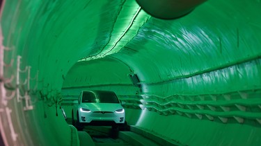 Elon Musk, co-founder and chief executive officer of Tesla Inc., arrives in a modified Tesla Model X electric vehicle during an unveiling event for the Boring Company Hawthorne tunnel in California last December.