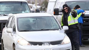 In this file photo, officers from the Greater Sudbury Police and Ontario Provincial Police conducted spot checks on Municipal Road 80.