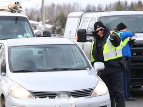 In this file photo, officers from the Greater Sudbury Police and Ontario Provincial Police conducted spot checks on Municipal Road 80.